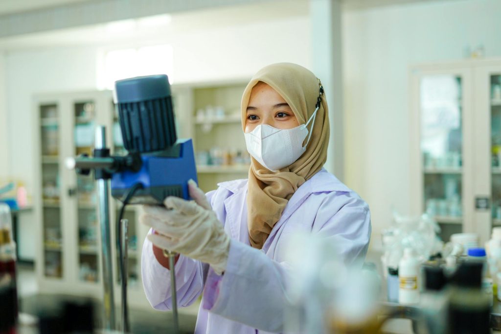 a young woman working in a laboratory