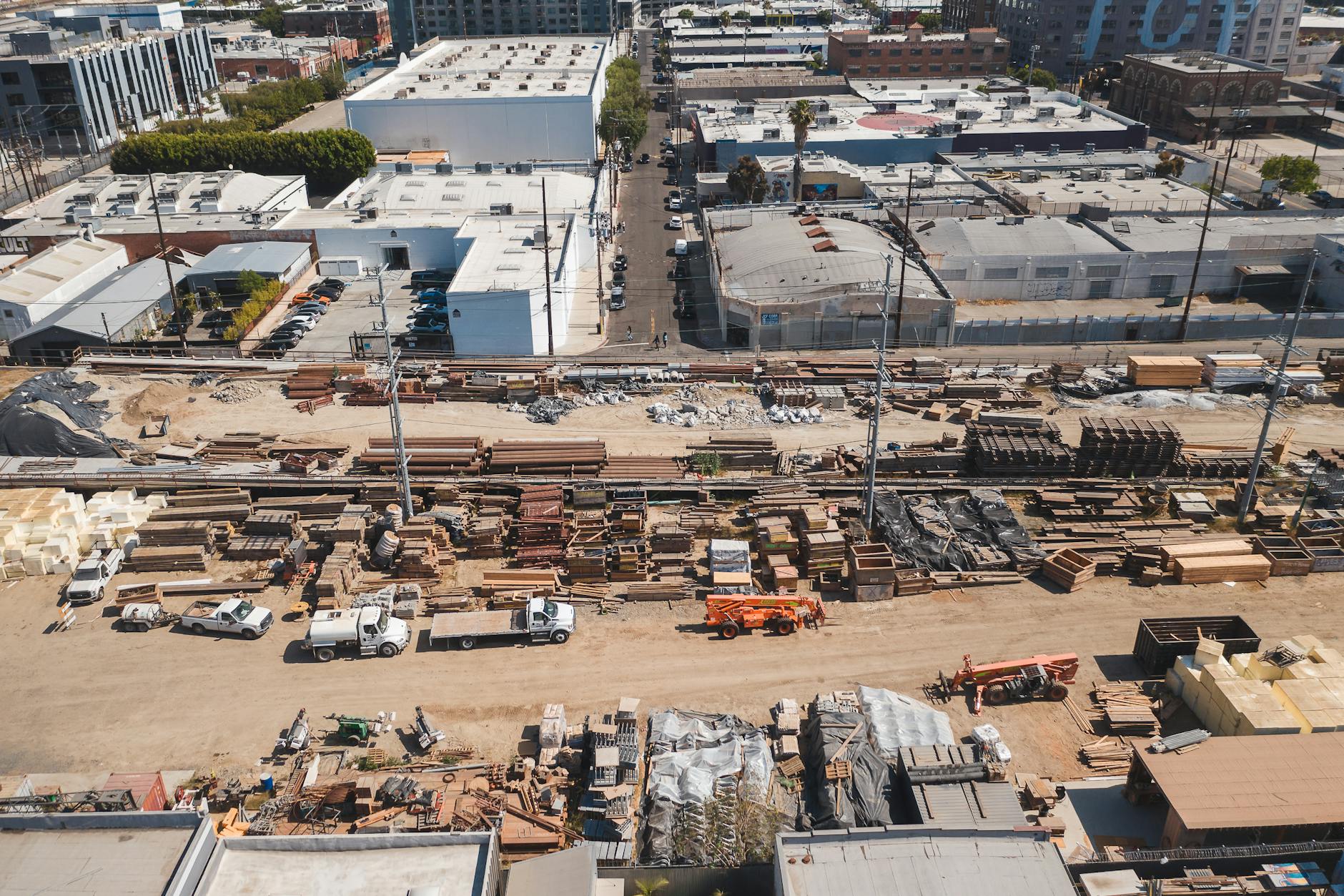 aerial view of motor vehicles on dirt road